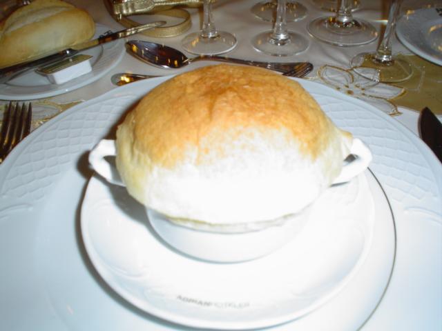 Cream of lobster soup with puff pastry and a sprinkling of P